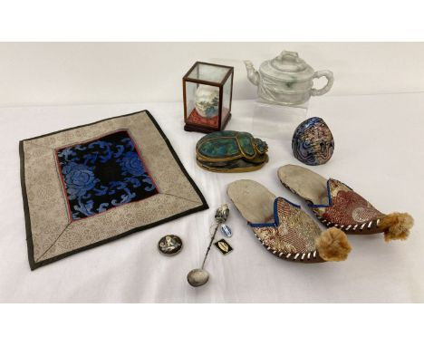 A collection of assorted oriental items to include handmade slippers and carved jade teapot (a/f).  