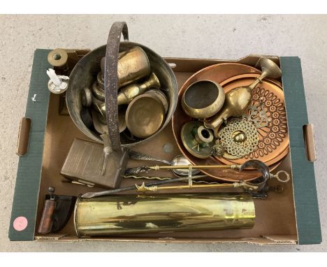 A box of vintage brass and metalware. To include 75mm shell case, brass jam pan, fireside tools, small vintage iron and scale