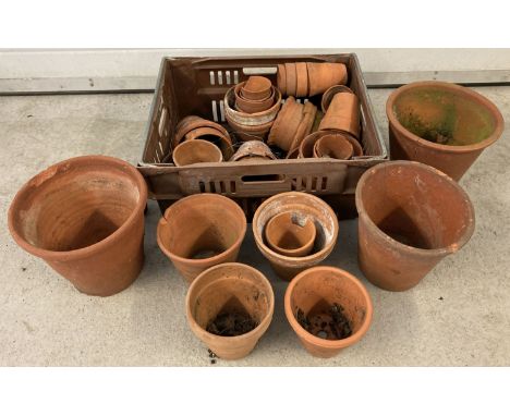 A collection of vintage terracotta garden pots in varying sizes and conditions.  Largest approx. 21cm tall x 24cm diameter.