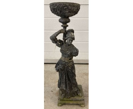 A vintage metal garden ornamental figure of a lady in classical dress on stepped base. Holding a removable plant holder. One 