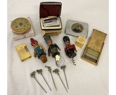 A small collection of vanity, smoking and drinking related items. To include Stratton's compact and compact clothes brush, an