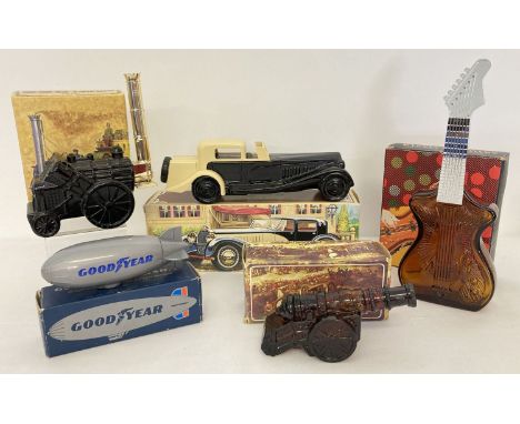 5 boxed vintage empty Avon novelty aftershave bottles. Comprising: Siege Cannon, Electric Guitar, Goodyear Airship, Rocket 02