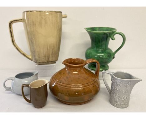 A collection of 6 modern and vintage ceramic jugs, of varying sizes. To include: Branksome, Portmeirion and Whittard. Largest