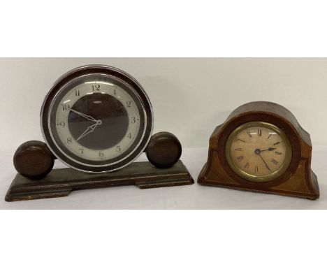 An Art Deco design 'Metamec, Dereham' wood and chrome framed mantel clock together with one other. Metamec clock has bakelite