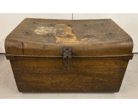 A vintage 2 handled tin trunk with studded detail to top.  Approx. 45cm tall x 70 x 50cm.