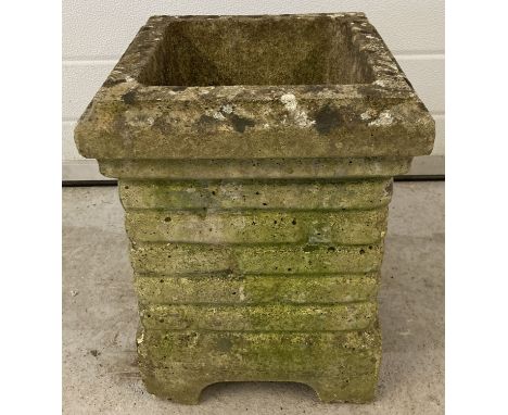 A vintage concrete garden planter in the shape of a chimney.  Approx. 41 x 31cm.