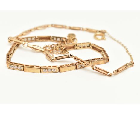 A 9CT GOLD BRACELET AND A YELLOW METAL BRACELET, the first a yellow gold fancy link bracelet with textured detail, fitted wit