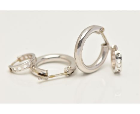 TWO PAIRS OF HOOP EARRINGS, the first a pair of hollow white metal hoops, with lever fittings, approximate width 18mm, stampe