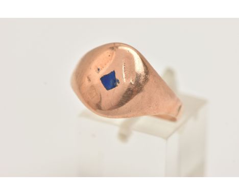 A YELLOW METAL MASONIC RING, a signet ring with a worn engraved masonic symbol, unmarked, ring size R 1/2, approximate gross 