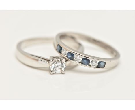TWO GEM SET RINGS, the first a white metal single stone ring, prong set with a circular cut cubic zirconia, stamped 750, stam