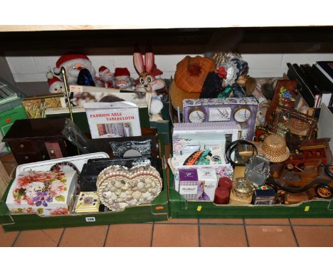 FOUR BOXES OF MISCELLANEOUS SUNDRIES, to include toiletry gift sets, a cased Storm Ronson lighter, a shell covered heart shap
