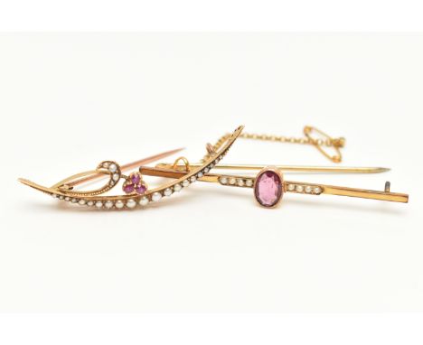TWO EARLY 20TH CENTURY BROOCHES, the first a bar brooch with a central oval amethyst in a millegrain setting flanked by split