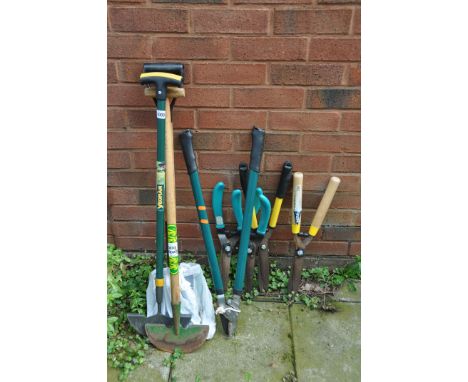 A SMALL SELECTION OF GARDENING TOOLS including hedge clippers, loppers, lawn edgers, etc