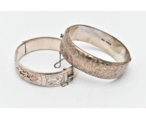 TWO SILVER HINGED BANGLES, the first detailed with yellow metal thistles, fitted with an integrated push pin clasp, hallmarke