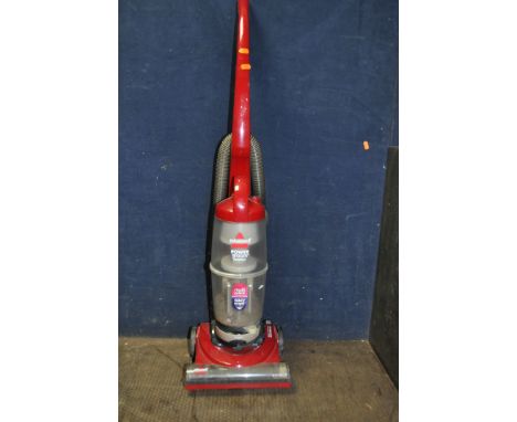 A BISSELL POWER GROOM COMPACT UPRIGHT VACUUM CLEANER (PAT pass and working) and a Flymo lawn mower (untested) (2)