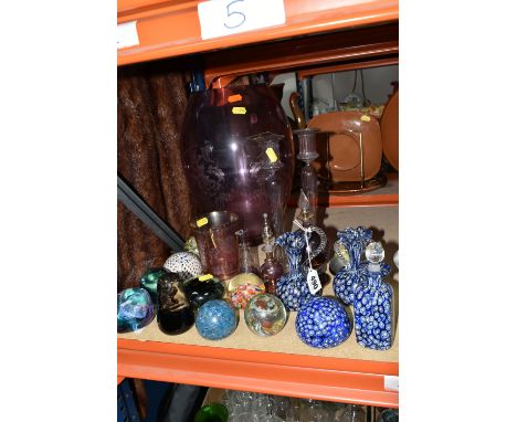 A GROUP OF GLASS PAPERWEIGHTS AND GLASSWARE, comprising two Caithness paperweights, a large amethyst coloured glass vase with
