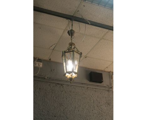 A BRASS AND ENGRAVED GLASS LANTERN, of rectangular tapering form.