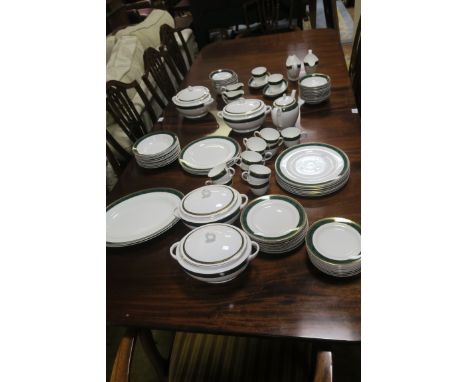A WEDGEWOOD BONE CHINA "AEGEAN" PATTERN DINNER SERVICE, the white ground with green and gilded borders, comprising:Two Oval S