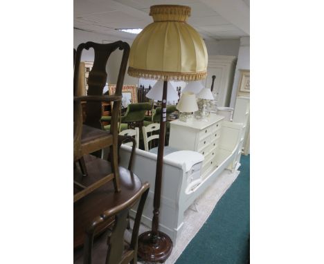 A BEECHWOOD STANDARD LAMP WITH SHADE