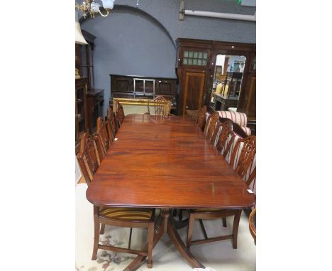 A VERY FINE MAHOGANY ELEVEN PIECE DINING ROOM SUITE, comprising ten Hepplewhite style dining room chairs, including a pair of