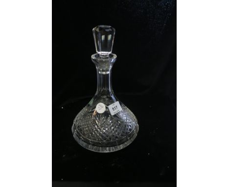 A CUT GLASS SHIP'S DECANTER WITH STOPPER.