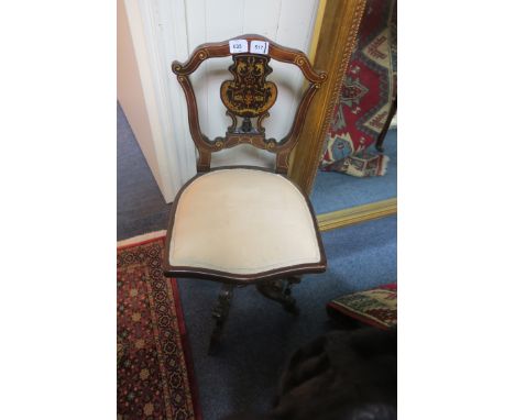 A GOOD EDWARDIAN MAHOGANY AND MARQUETRY MUSIC CHAIR, the shaped scrolled top rail above a panelled splat with upholstered sea