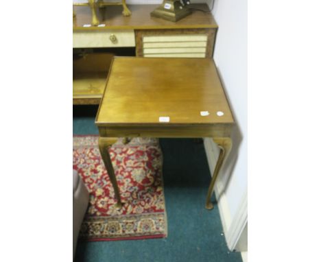 A MAHOGANY CARD TABLE / TEA-TABLE the square moulded top above a plain frieze on cabriole legs with pad feet