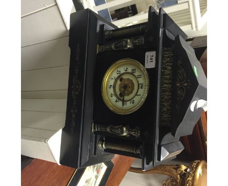 A VICTORIAN STYLE BLACK MARBLE MANTLE CLOCK, in the form of a Classical Casino, the frieze decorated with brass embossed danc