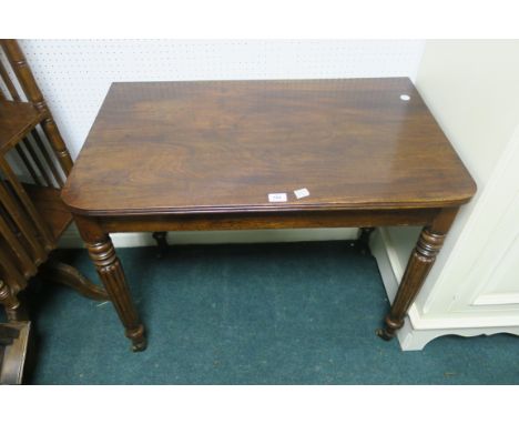 A REGENCY MAHOGANY SIDE TABLE the rectangular top with readed rim on lobed and ring turned legs 76cm X 82cm X 57cm