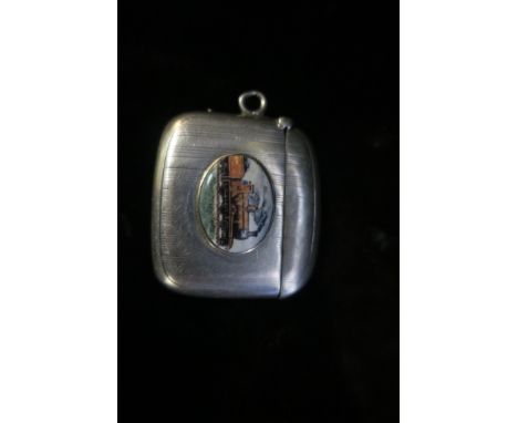 A SILVER ENGINE TURNED VESTA CASE, with enamelled inset depicting a steam train.