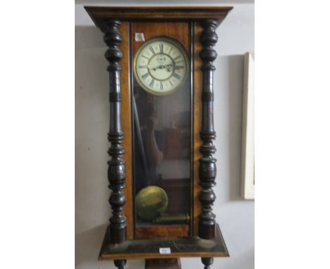 AN EDWARDIAN WALNUT AND BEECHWOOD CASE VIENNA CLOCK 