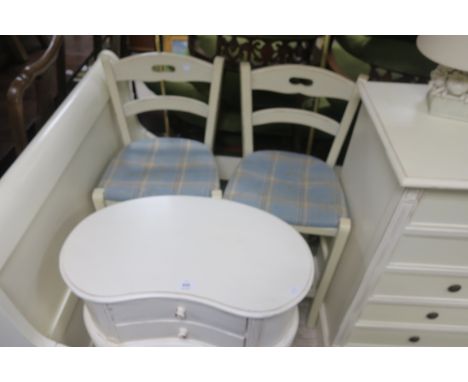 A COLLECTION OF WHITE PAINTED FURNITURE including two kidney shaped tables, open front book shelf, a lift top trunk, a pair o