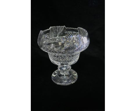 A FINE WATERFORD CUT GLASS BOWL, raised on a circular spreading foot,23cms high.