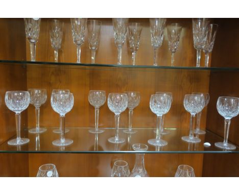 A SET OF TWELVE WATERFORD CUT GLASS WINE GLASSES (en suite to previous lot) the circular bowl on octagonal tapering stem with