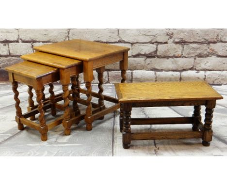 OAK OCCASIONAL TABLES comprising nest of three with barley twist legs and a low table or stool with bobbin turned legs (4)