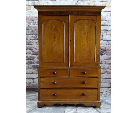 VICTORIAN OAK & MAHOGANY LINEN PRESS, ogee cornice and plain frieze above arched panelled doors, on a chest base of four draw