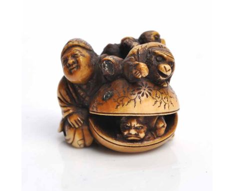 EARLY 20TH CENTURY JAPANESE IVORY NETSUKE 
modelled with a figure and monkeys, one monkey inside a clam shell, signed, 3cm hi