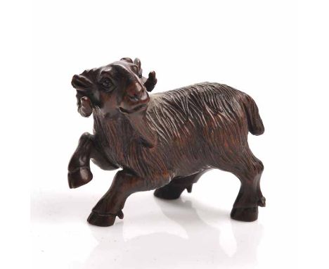 EARLY 20TH CENTURY CARVED WOODEN NETSUKE
modelled as a ram, signed, 5cm wide 