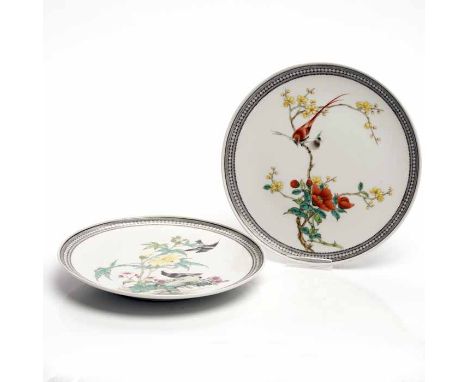 ATTRACTIVE PAIR OF CHINESE CIRCULAR WALL PLATES 
decorated with birds amongst foliage in enamel colours, within black diaper 