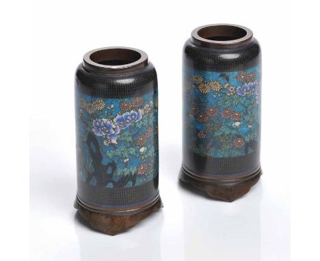 PAIR OF EARLY 2OTH CENTURY JAPANESE ENAMEL VASES
of cylindrical form, with insect and floral decoration, each 16cm high