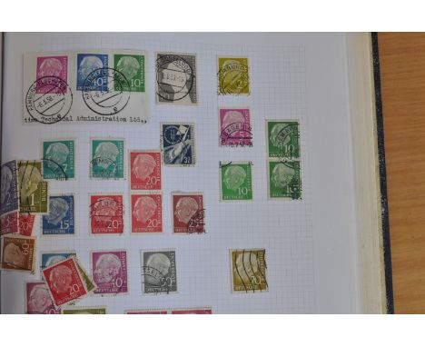 Germany blue warrick loose leaf album post war some 35 pages with some loose stamps.