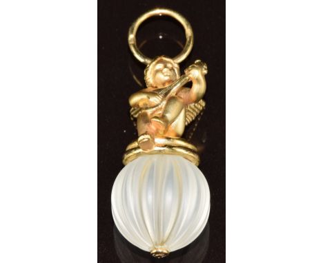 Charles Garnier 18ct gold pendant depicting a cherub playing a lute sitting on a rock crystal ridged sphere/ bead, 6.1g, 3.7c