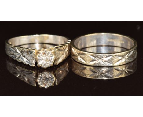 A 9ct white gold ring set with a diamond, with matching wedding band / ring, 5.6g, size N