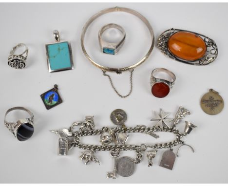 A collection of silver jewellery including charm bracelet, bangle, two rings set with agate, ring set with synthetic opal, Ce