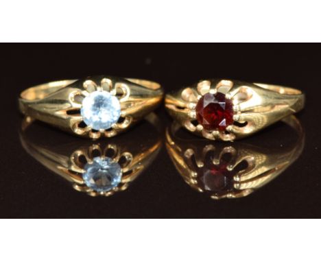 Two 9ct gold rings, one set with a garnet and the other paste, 4.4g, size R &amp; W