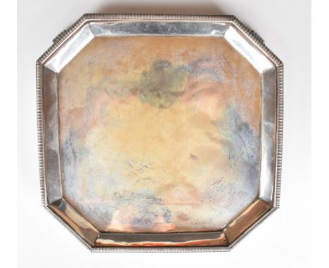 Art Deco hallmarked silver octagonal tray or salver raised on four feet, Sheffield 1933, maker&nbsp;Harrison Brothers &amp; H
