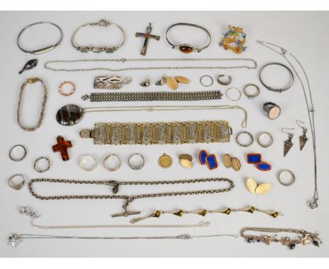 A collection of silver jewellery including five bracelets, christening bangle, fourteen rings, bracelet set with pressed ambe