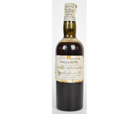 Black & White Scotch Whisky from the Glentauchers - Glenlivet distillery, possibly 1960s, 750ml. PLEASE NOTE ALL ALCOHOL & TO