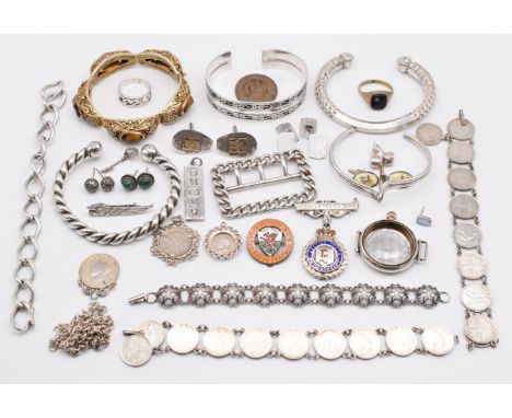 A collection of silver including Chinese filigree bracelet set with tiger's eye, four bangles, buckle, two Belgium coin brace