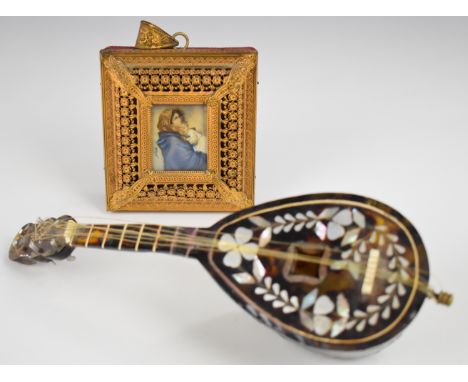 Two novelty musical boxes, one in the form of a portrait miniature the other a mandolin, length 22cm